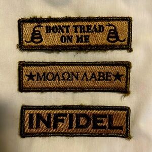 Bundle of three army/military-themed morale patches
Velcro fastening.
